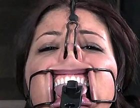 Tongue clamped bdsm sub snatch teased