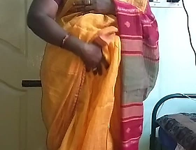 Desi indian horny tamil telugu kannada malayalam hindi cheating wife vanitha wearing orange colour saree showing big boobs and shaved pussy press hard boobs press nosh rubbing pussy masturbation